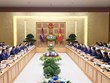 Entretien entre les Premiers ministres vietnamien et cambodgien