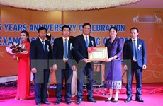 La compagnie d'assurances LAP contribue aux relations Vietnam-Laos