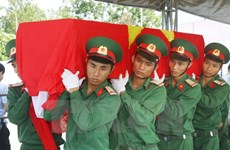 Nghe An : inhumation des restes de soldats tombés au Laos