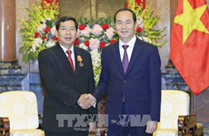 Le président vietnamien reçoit le président de la Cour populaire suprême du Laos