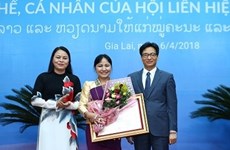 Des distinctions honorifiques remises à des femmes vietnamiennes et laotiennes