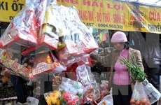 Avant le Têt, les Vietnamiens fêtent le jour des Tao Quan
