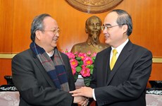 Le président du CC du FPV rencontre le président du Conseil épiscopal du Vietnam