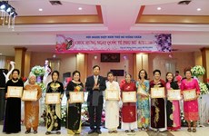 Les femmes vietnamiennes au Laos fêtent leur Journée