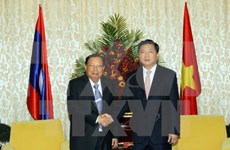Activités du secrétaire général du Parti et président du Laos au Vietnam
