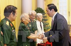 Le chef de l’Etat rencontre d’anciens soldats volontaires au Laos 