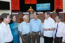 Le président Tran Dai Quang rencontre des électeurs d'Ho Chi Minh-Ville   