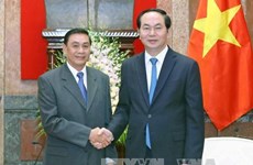Le président Tran Dai Quang reçoit le chef du Bureau de la présidence du Laos