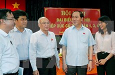 Le président Tran Dai Quang rencontre des électeurs de Ho Chi Minh-Ville