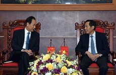 Le président de Xinhua travaille avec des responsables du journal Nhan Dan