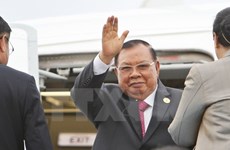 Le président Trân Dai Quang reçoit le président laotien Bounnhang Vorachith