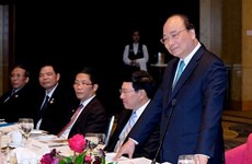 Le PM Nguyen Xuan Phuc rencontre des investisseurs australiens et vietnamiens 