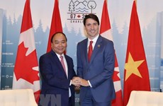 Entretien entre les Premiers ministres vietnamien et canadien