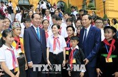 Le président Tran Dai Quang rencontre des enfants en situation difficile