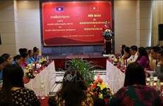 Les unions des femmes de Quang Nam et Sékong (Laos) intensifient leur coopération