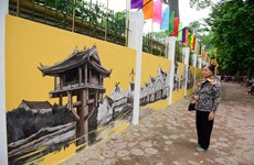  Des peintures murales font revivre Hanoi d'antan