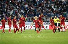 Asian Cup 2019 : le PM et les médias étrangers célèbrent la victoire du Vietnam 