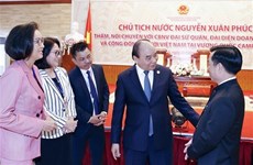 Le président Nguyên Xuân Phuc rencontre la communauté vietnamienne au Cambodge