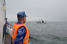 Les garde-côtes vietnamiens et chinois effectuent une patrouille conjointe