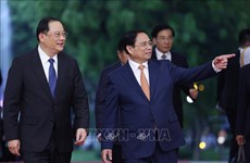 Rencontre des Premiers ministres du Vietnam et du Laos
