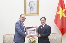 Le vice-PM Vuong Dinh Huê reçoit un responsable de l’OCDE