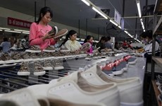 Soixante importateurs américains des chaussures sondent le marché vietnamien