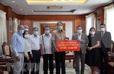 COVID-19 : Le gouvernement vietnamien continue d'assister les Viet kieu au Laos