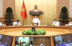 Le Premier ministre Pham Minh Chinh préside la réunion périodique du gouvernement en août