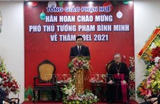 Le vice-PM Pham Binh Minh formule ses vœux de Noël aux catholiques de Thua Thien-Huê