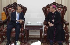Le président Nguyen Xuan Phuc formule ses vœux de Noël aux catholiques