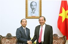 Promotion des liens entre la Cour populaire suprême du Vietnam et du Laos 