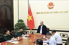 Le président préside une réunion sur la résolution du Parti sur la stratégie de défense nationale