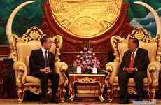 Le secrétaire général du PPRL et président laotien reçoit le ministre chinois des AE