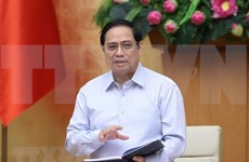 Le Premier ministre Pham Minh Chinh appelle à s’unir pour vaincre l’épidémie de Covid-19