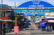Le plus grand marché de gros de Hanoi ferme temporairement ses portes à cause du Covid-19