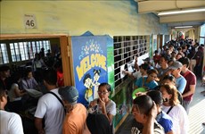 Les électeurs philippins vont aux urnes