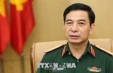 Vietnam-Laos : Entretien en ligne entre les ministres de la Défense 