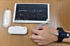 Technologie de surveillance à distance des patients du COVID-19