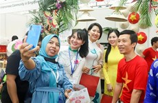 Le Vietnam participe à la célébration de la Journée internationale des migrants à Singapour