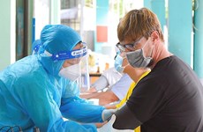 Vaccination pour des résidents étrangers à Hô Chi Minh-Ville