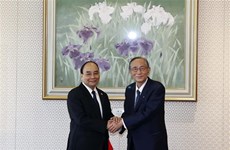 Le président Nguyen Xuan Phuc rencontre le président de la Chambre des représentants du Japon