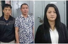 Trois Chinois arrêtés pour arnaque sur des DAB à Hanoi