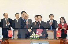 Signature d’un accord de coopération entre VNA et Xinhua