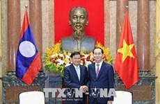 Le président Trân Dai Quang reçoit le Premier ministre laotien Thongloun Sisoulith