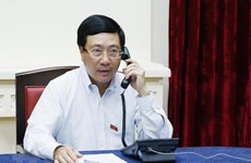 Conversation téléphonique entre le vice-PM Pham Binh Minh et le chef de la diplomatie singapourienne
