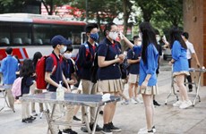 Les médias internationaux rapportent le retour à l'école au Vietnam