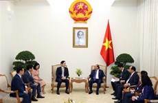 Le PM Nguyen Xuan Phuc reçoit le vice-président de Samsung