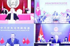 Renforcement de la coopération entre les deux Partis communistes du Vietnam et de Chine