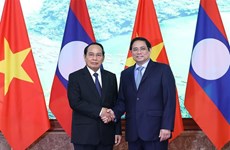 Vietnam et Laos promevent la coopération multiforme