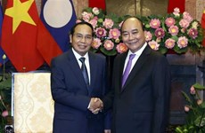 Pour promouvoir les relations d'amitié et de coopération intégrale Vietnam-Laos 